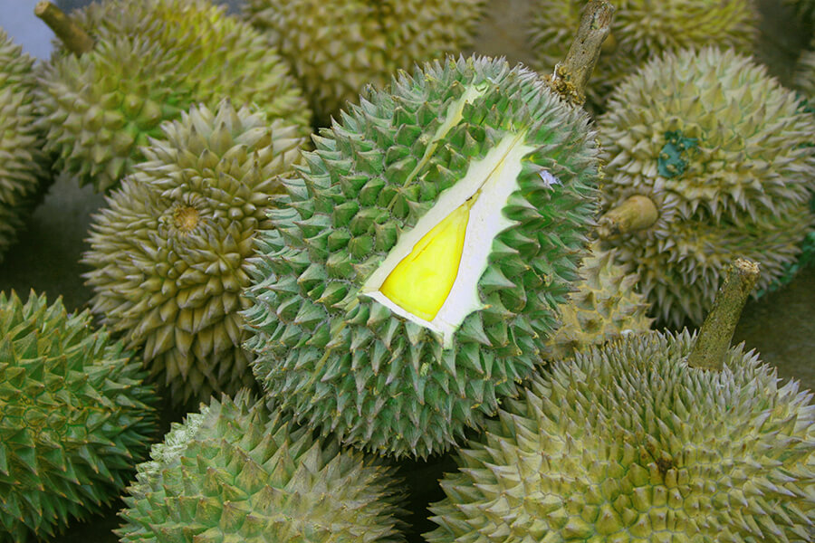 Durian with triangular window into its soul.